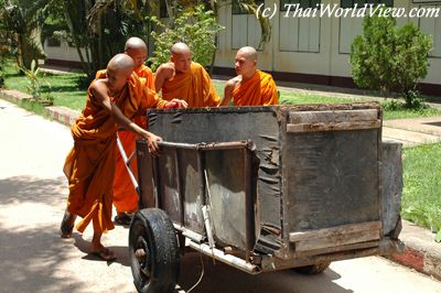 Monks helping each other
