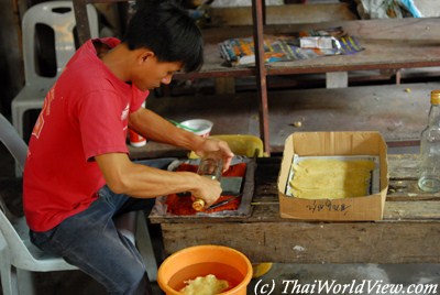 Craftsman working with wax