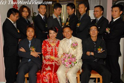 Bride and groom with unmarried men
